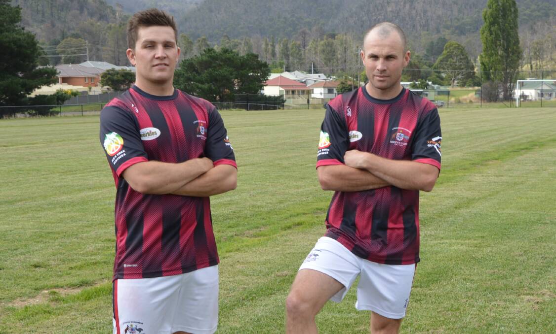CHECKERBOARD: Brad Luka and Martin Hunter show off Lithgow Workmen's 2021 Western Premier League kit, which we're pretty neutral on. Photo: LITHGOW MERCURY