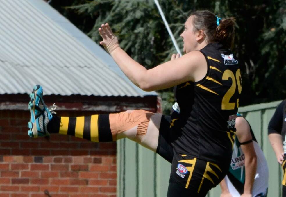 PUT THE BOOT IN: Nita Noble has been in good form for the Tigerettes, a side that's improving every week and sits third ahead of the byes. Photo: FACEBOOK