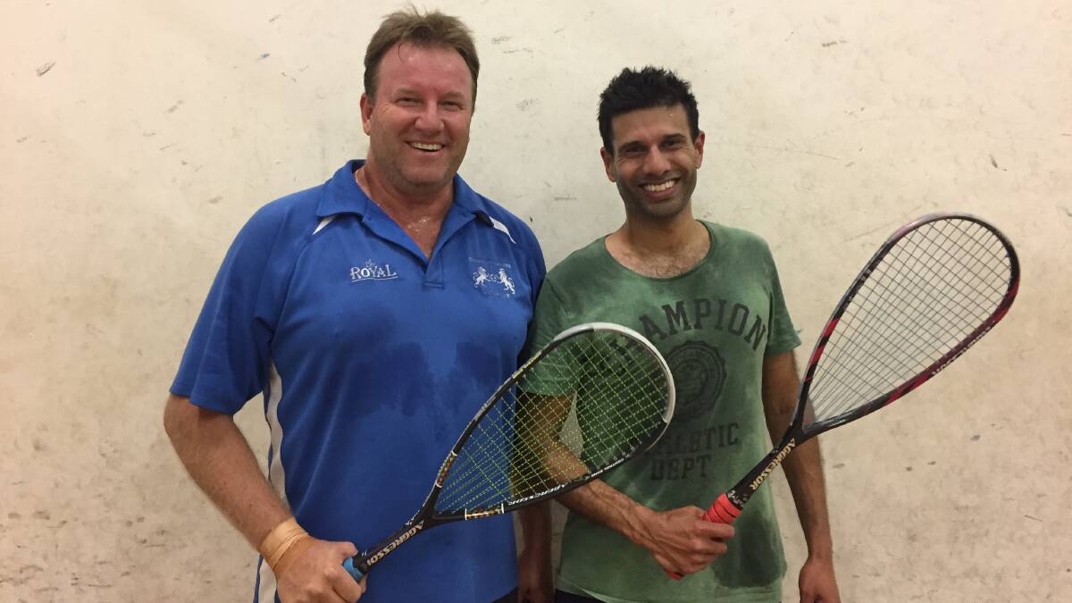 SQUASHED: Mark Goes (right) defeated Steve Elliot last week in a five-game thriller, after the latter just returned from Canada. Photo: CONTRIBUTED