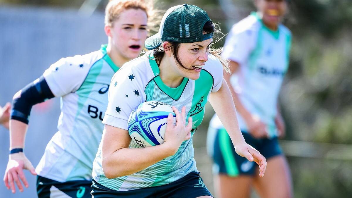 WORKING HARD: Grace Hamilton carries at Wallaroos training this week. Saturday's Test against the Black Ferns means the world to them. Photo: STUART WALMSLEY