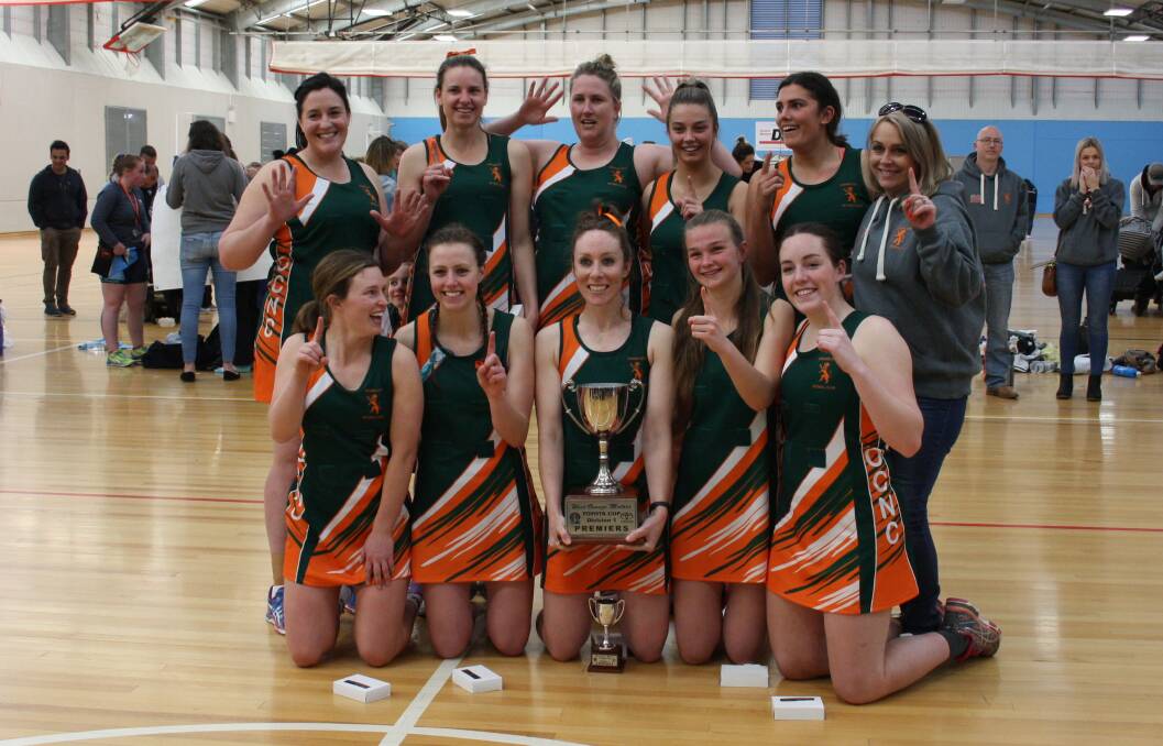 LIONS ROAR: Orange City celebrates its 10th straight title last year. This year, the group has been split across the club's two top tier sides. Photo: MICHELLE COOK