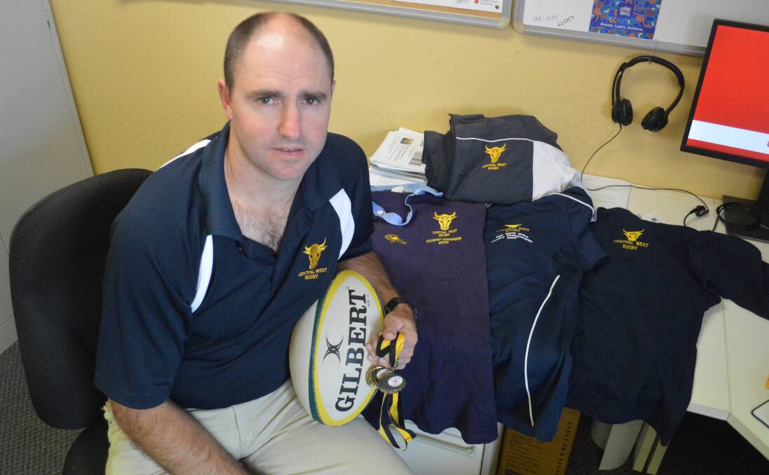 ONE LAST TIME: Emus' Nik Granger reflects on his long history with Central West during the week, showing off a number of old jerseys and two of his three Country Championship medals. Photo: MATT FINDLAY