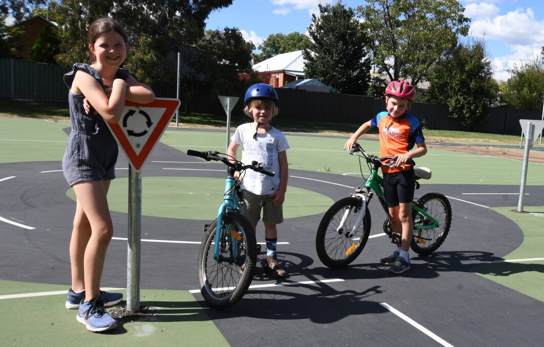ROAD RULES: Pippa and Henry Brady and Eleanor Crump are among the young cyclists taking advantage of the new training track at Moulder Park. Photo: CARLA FREEDMAN