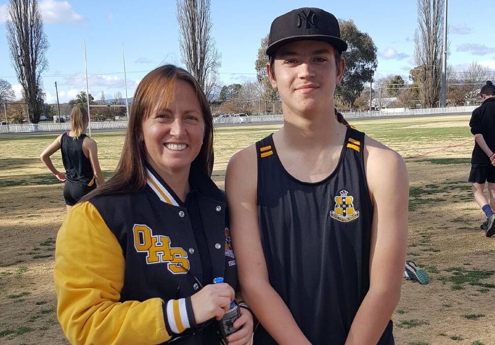 PASSING THE MANTLE: Mel Hope with 14-year-old son Kaelan Portass, who became the fourth generation of the family to compete in the Astley Cup last week. Photo: CONTRIBUTED