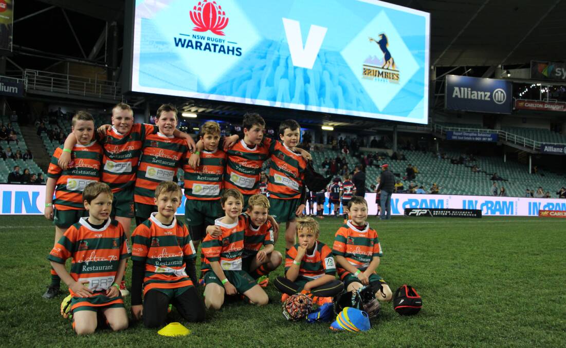 FOLLOWING IN THE FOOTSTEPS: Orange City's under 9s pose for a photo at Allianz Stadium, where they played on the same night as the Waratahs and Brumbies. Photo: CONTRIBUTED
