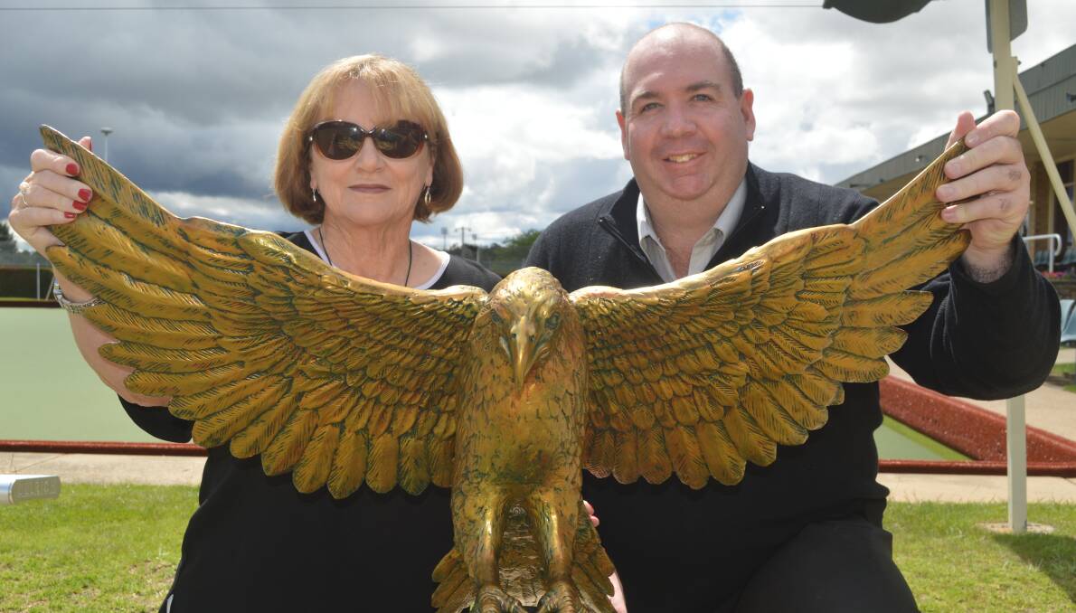 IN FINE FEATHER: Golden Eagle gurus Jean Kennedy and Neil Southcombe show off the impressive trophy on Wednesday. Photo: MATT FINDLAY