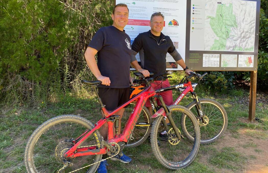 TICKET TO RIDE: Member for Barwon Roy Butler and Member for Orange Phil Donato took on the Galinbuninya trail near Orange on Tuesday. Photo: CONTRIBUTED