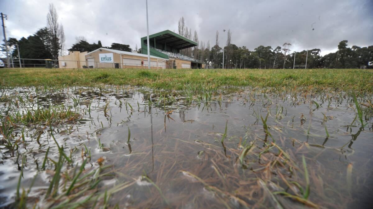 WET, WET, WET: Endeavour Oval was saturated on Friday afternoon, the Emus club was forced to move this weekend's games as a result of the weather. Photo: JUDE KEOGH