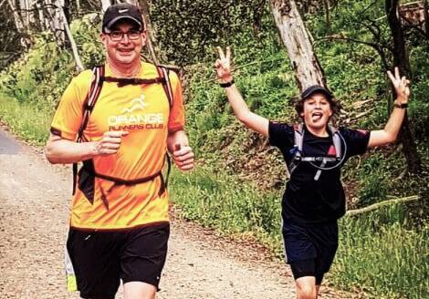 Father and son Richard and George Hogg running in the Federal Falls Trail run.They completed the 6.6km track on Sunday morning at Federal Falls. Photo: KIM ANLEZARK