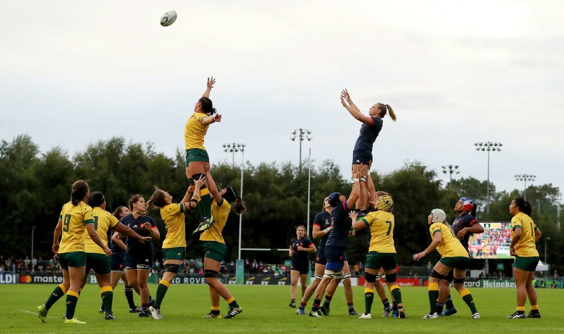 FIGHTING FOR FIFTH: Kinross product Grace Hamilton (third Australian from left) sends a Wallaroos jumper up for a lineout in Monday's defeat to the French. Fifth is the best her side can hope for now. Photo: INPHO/BRYAN KEANE.