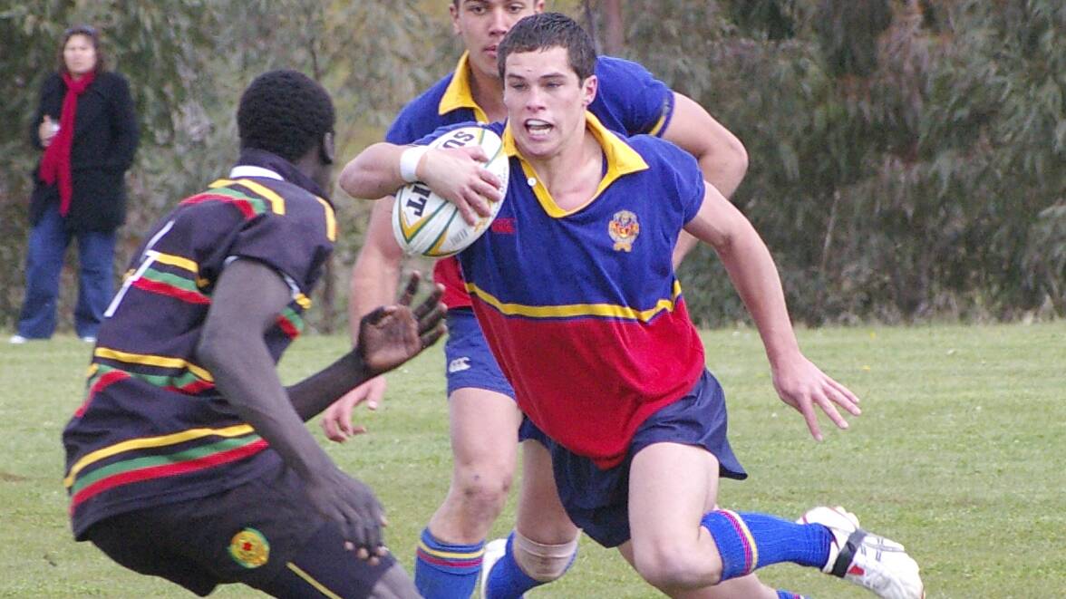 BACK IN THE DAY: Dan Mortimer shimmies through Illawarra Sports High's defensive line back in 2007, during James Sheahan's Yates Shield campaign. Photo: MARK LOGAN
.