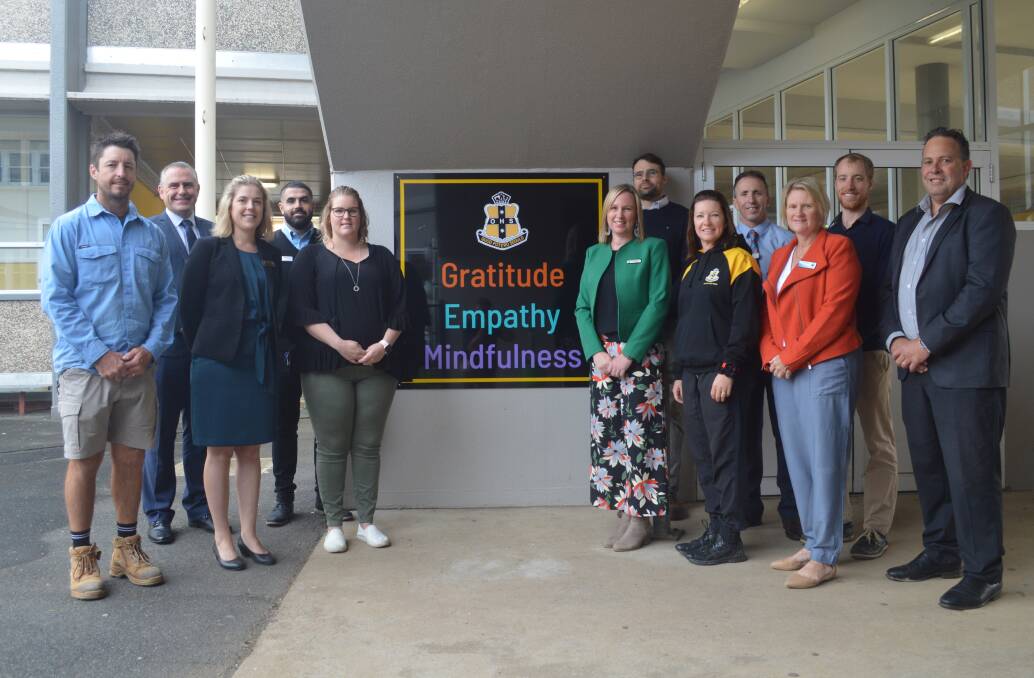 PILLARS: The Resilience Project's key parties are drivers show off the program's three core pillars - gratitude, empathy and mindfulness - at Orange High. Photo: MATT FINDLAY