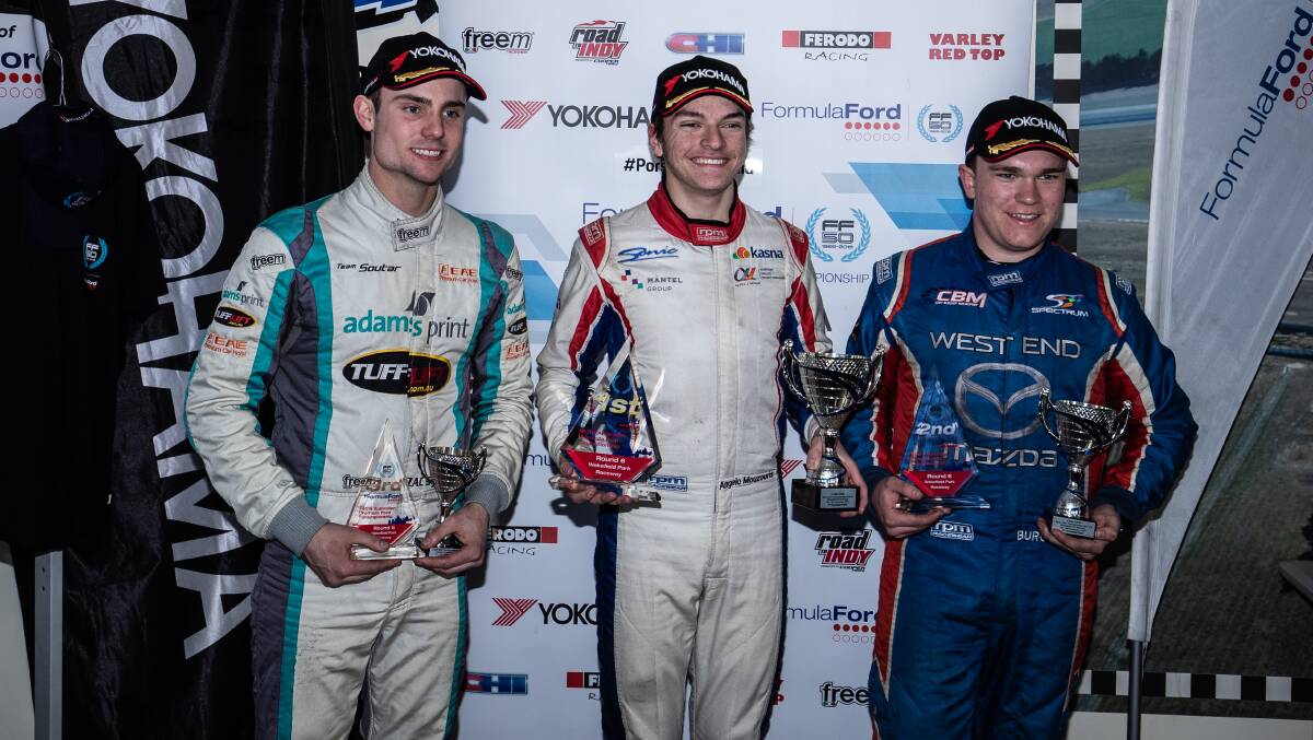 PODIUM FINISH: Orange's Cody Burcher (right) celebrates his second finish in last weekend's Wakefield Park round of the Australian Formula Ford Series. Photo: INSYDE MEDIA 