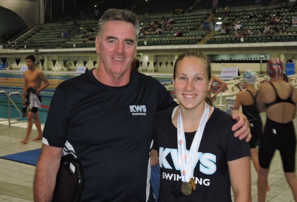 WITHIN INCHES: Emily Nobbs (right), pictured with Kinross coach Kim Taylor, celebrated a remarkable fourth at the national titles, just missing a podium finish. Photo: CONTRIBUTED