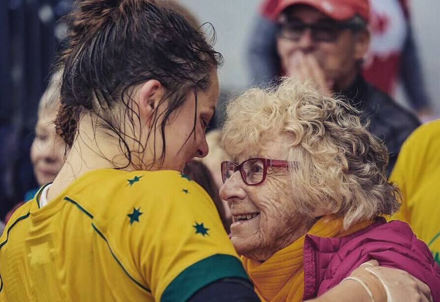 EMOTIONAL: Grace Hamilton and grandmother Irene Sticka share a moment after one of the Wallaroos' games in the 2017 World Cup.