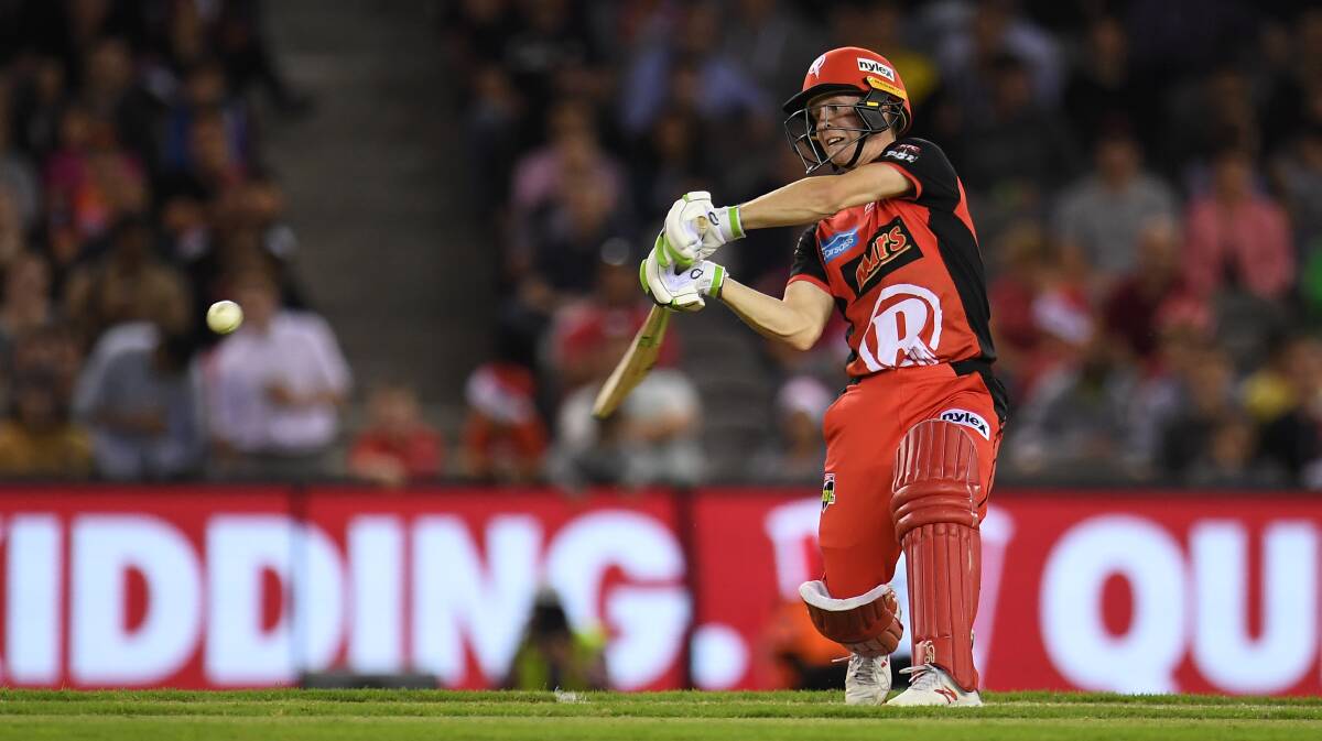 GOING BIG: Renegades' gun Sam Harper hits out in his match-defining dig against Perth on Thursday night. Photo: AAP/JULIAN SMITH