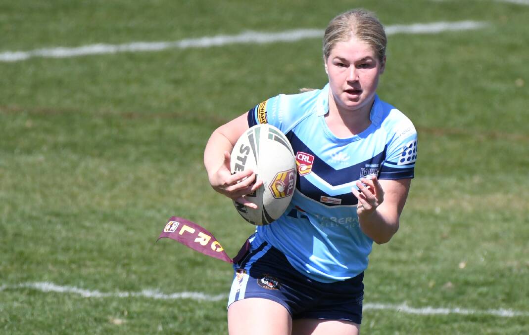 BACKING UP: Lilly Baker was one of eight Orange Hawks who played in both league tag grand finals, a tough ask by anyone's standards. Photo: CHRIS SEABROOK