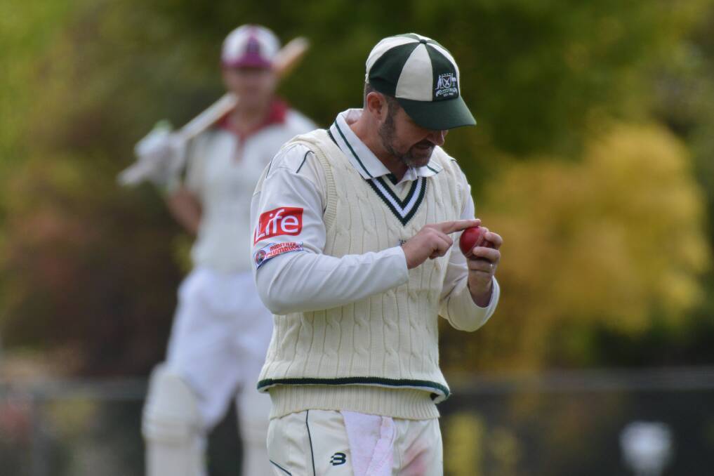 MVP: Shaun Churchill puts some work into the ball at Riawena Oval, he shared man-of-the-match honours in the second grade decider. Photo: MATT FINDLAY