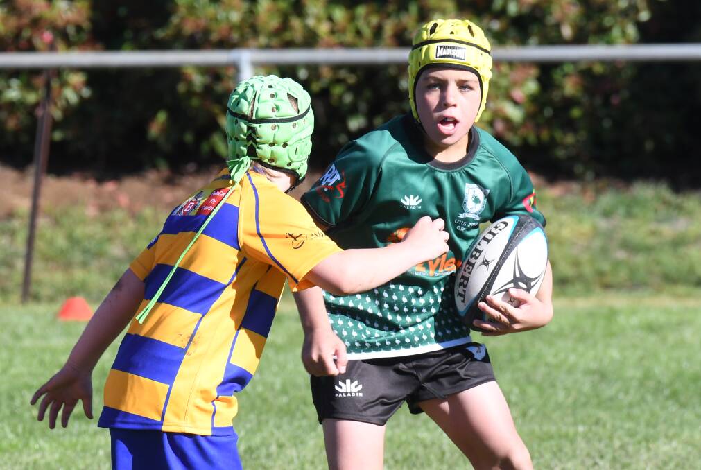 HEADS-UP PLAY: AJ Logan weighs up his options for Emus in Central West Junior Rugby Union's opening Wallas Gala Day of the year at Endeavour Oval. Photo: CARLA FREEDMAN