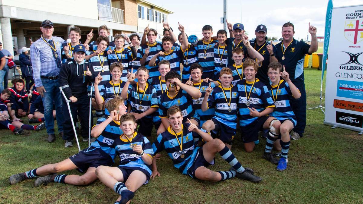 GOING AGAIN: Central West celebrates their under-14 country championship crown, they're focused on the state titles now. Photo: NSWCJRU
