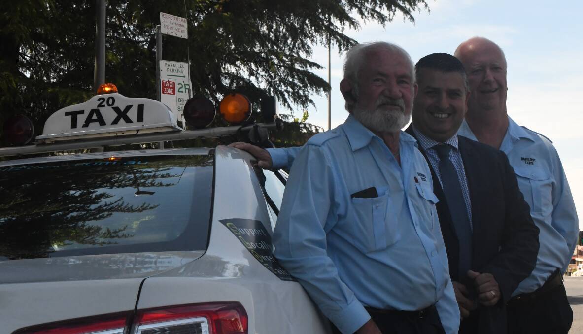 BATHURST TAXI TUCKER: NSW Taxi Council deputy chief executive officer Nick Abrahim (centre) with Bathurst Taxis' Dean Shadbolt and Paul Shanahan at Friday's launch.