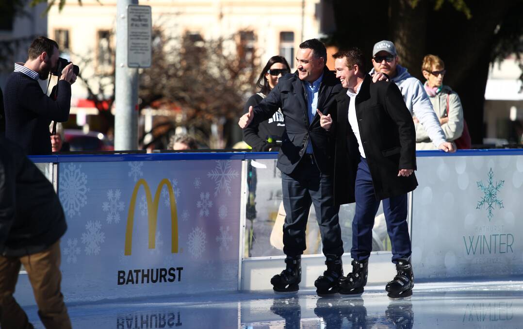 THIN ICE: Bathurst MP Paul Toole (right) with Nationals leader John Barilaro during the Bathurst Winter Festival in 2017. Photo: PHIL BLATCH
