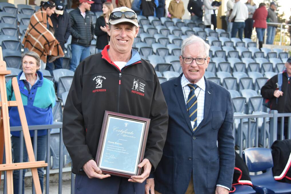 Peter Haynes was presented with a certificate of appreciation by president David Clifton for his dedication to New England Rugby Union. 