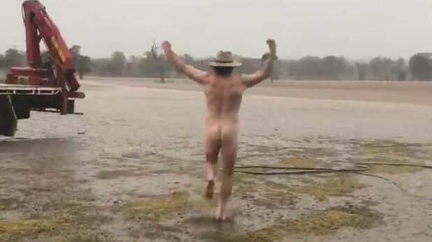 CELEBRATION: Dubbo farmer Glen Bloink stripped off for a 'nudie run' to celebrate rain fall across his drought-stricken property on the weekend. Photo: MIN COLEMAN 
 