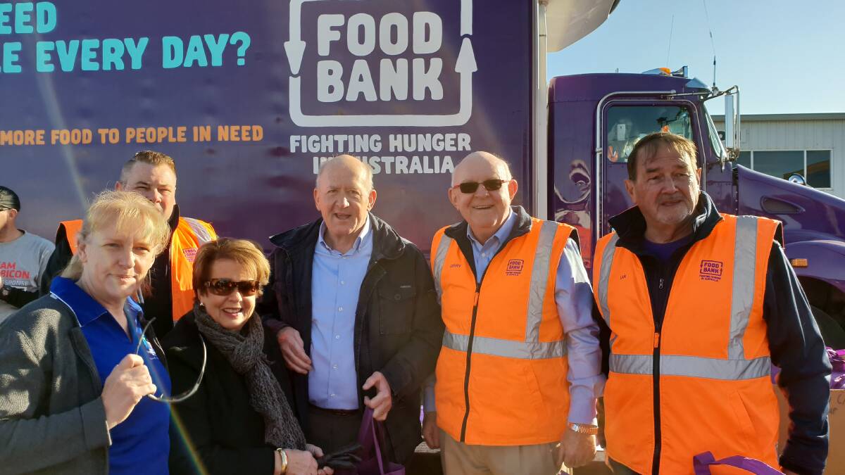 Lady Lynne Cosgrove, Governor-General Sir Peter Cosgrove, Gerry Andersen OAM CEO of Foodbank NSW & ACT, Ian Cox Food Supply Development, meet with members of the public at Dubbo. Photo: Supplied. 
