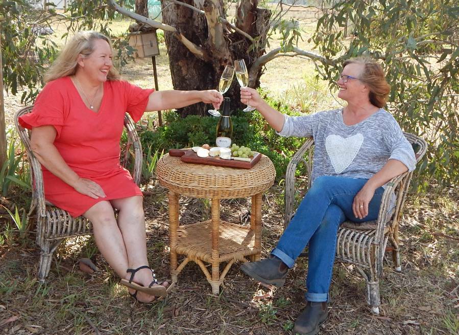 A toast to you: Mendooran's Pip Archer and Deb Kiem have turned their cheese making dreams into a reality. Photo: Supplied. 
