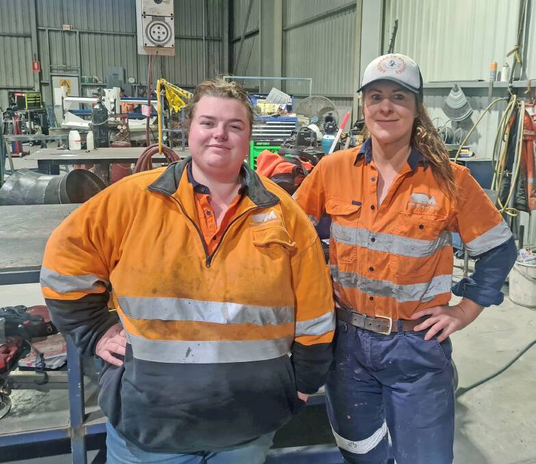 CREATIVE WORK: Metal fabrication apprentices Makaela Hobson, 26, and Kate Marchington, 33, both work at Orange Precision Metalcraft and are making a career an industry in which only one percent of workers are female. 