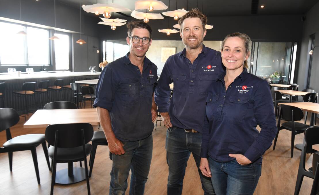ORANGE STARS: Printhie's Dave, Ed and Emily Swift at their cellar door and restaurant, which has been recognised in the 2022 Gourmet Traveller Cellar Door Awards. Photo: JUDE KEOGH