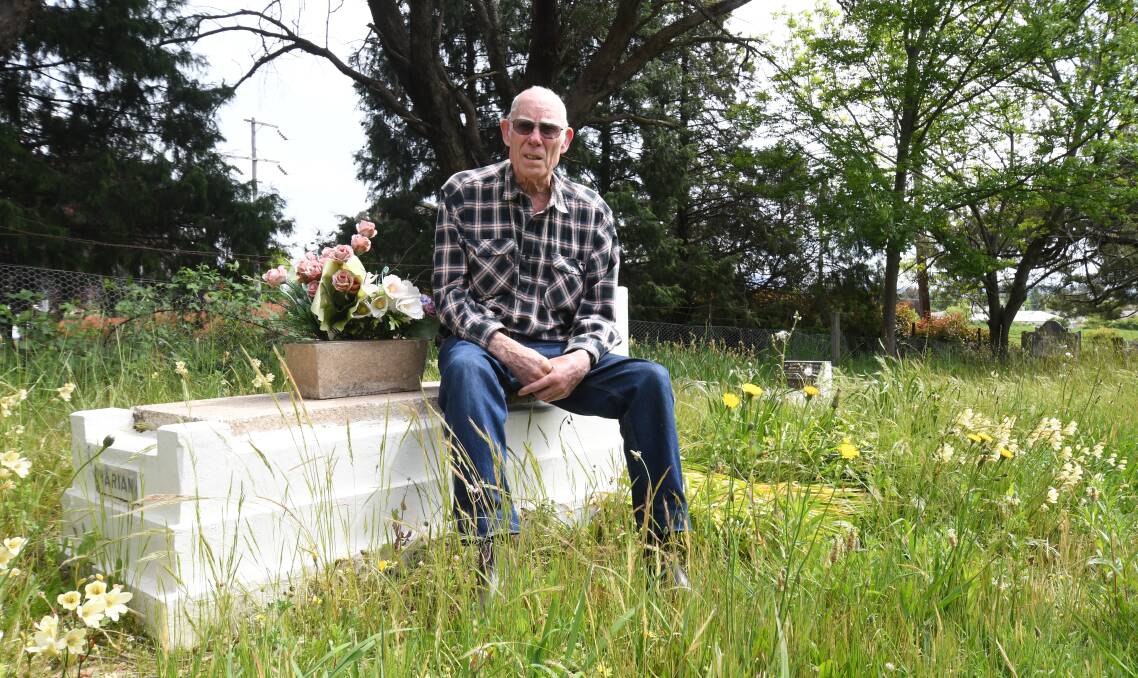 ABSOLUTELY APPALLED: Max Gregory was shocked to find knee high grass growing around his sister's grave. Photo: CARLA FREEDMAN.