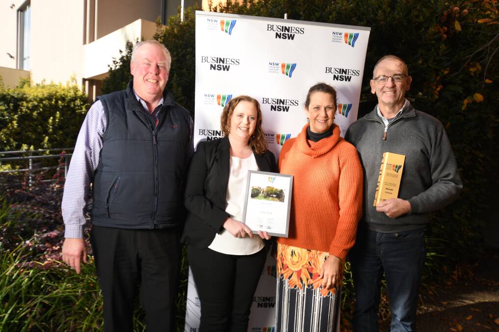 WIN: Blayney Shire councillor Bruce Reynolds, tourism manager Megan Rodd, Orange 360's Caddie Marshall and Blayney mayor Scott Ferguson. Photo: JUDE KEOGH