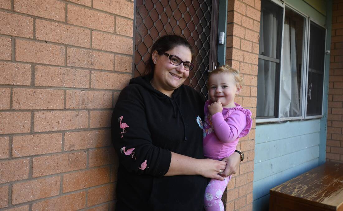 SO MANY STRUGGLING: Cassandra Beckingham, pictured with her daughter Isabella, is now in public housing. Photo: CARLA FREEDMAN