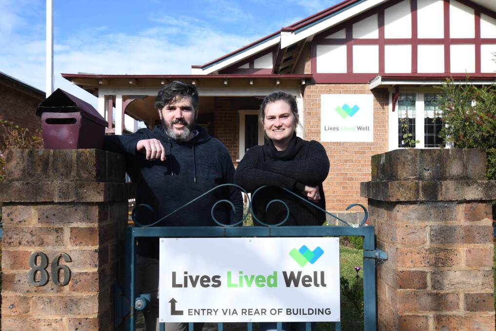 WORRYING TREND: Staff Josh Snowdon and Virginia Green at Lives Lived Well's outreach centre in Byng Street. More than half of clients are now reporting alcohol as their main drug of concern. PHOTO: CARLA FREEDMAN