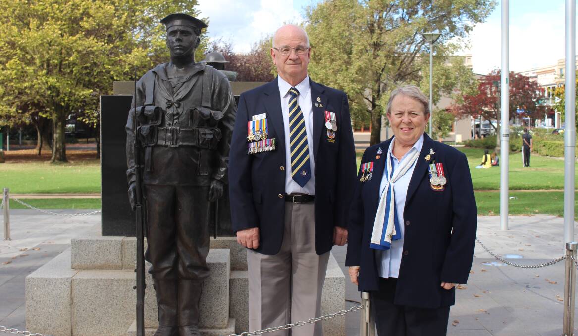 DAY FOR REMEMBERING: Returned Services League members Chris Colvin and Ros Davidson at the Cenotaph in Robertson Park ahead of Thursday's events for Anzac Day.