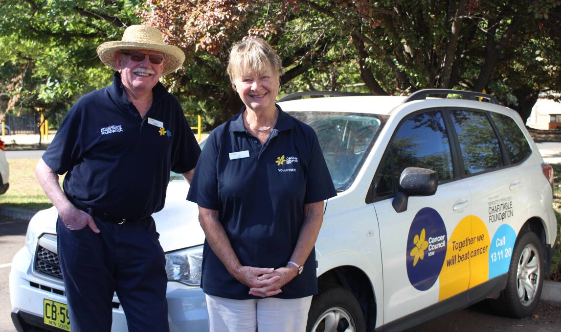 HAPPY AS LARRY: Graham Priddle and Jo Krats are two of the Cancer Council's drivers who help transport patients across the Central West. 