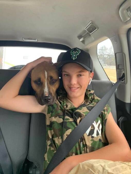 BEST BUDS: Carter Aplin with his four-legged pooch Ace. Photo: SUPPLIED. 