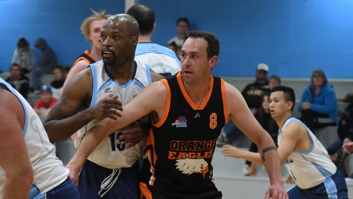 BOX OUT: Mitch Selwood contests with Bankstown's Andre Boykin in the Eagles' win on Saturday night. Photo: JUDE KEOGH