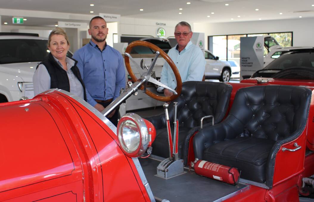 REVVING IT UP: Jacky Daquino, Justin Howarth, David Hill with a Willys 1914 Overlander at West Orange Motors. Photo: MAX STAINKAMPH