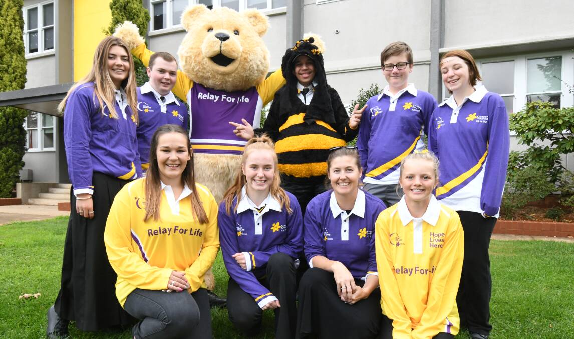 RELAY TEAM: (back) Lucy Johnston, Mitch O'Dea, Dougal Bear, The Hornet, Daffyd Vernon, Catie Gill-Prior and (front) Emily Scott, Brittany Boswell, Yelena Latter and Ella Lamrock. Photo: JUDE KEOGH 0502jkrelay1