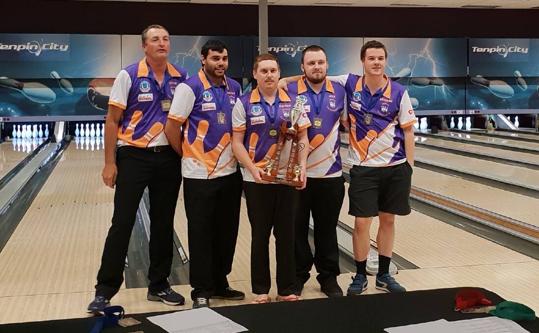 CHAMPIONS: Steve Eslick, Jordan Clark, Hayden Swallow, Nick Flannery and Edward Johnson with the trophy. Photo: SUPPLIED. 