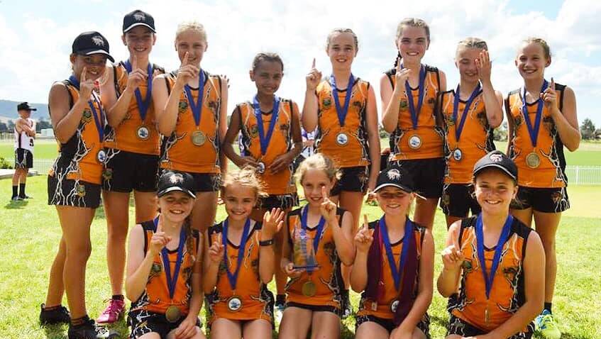 NUMBER ONE: The winning under 12s girls division of the Orange Thunder at Mudgee over the weekend. Photo: SUPPLIED. 