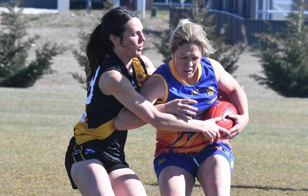 IN FORM: Jacqui Harris makes a tackle against the Dubbo Demons a few weeks ago. She's been appointed the Tigerettes' skipper for the remainder of the 2018 season. Photo: CARLA FREEDMAN