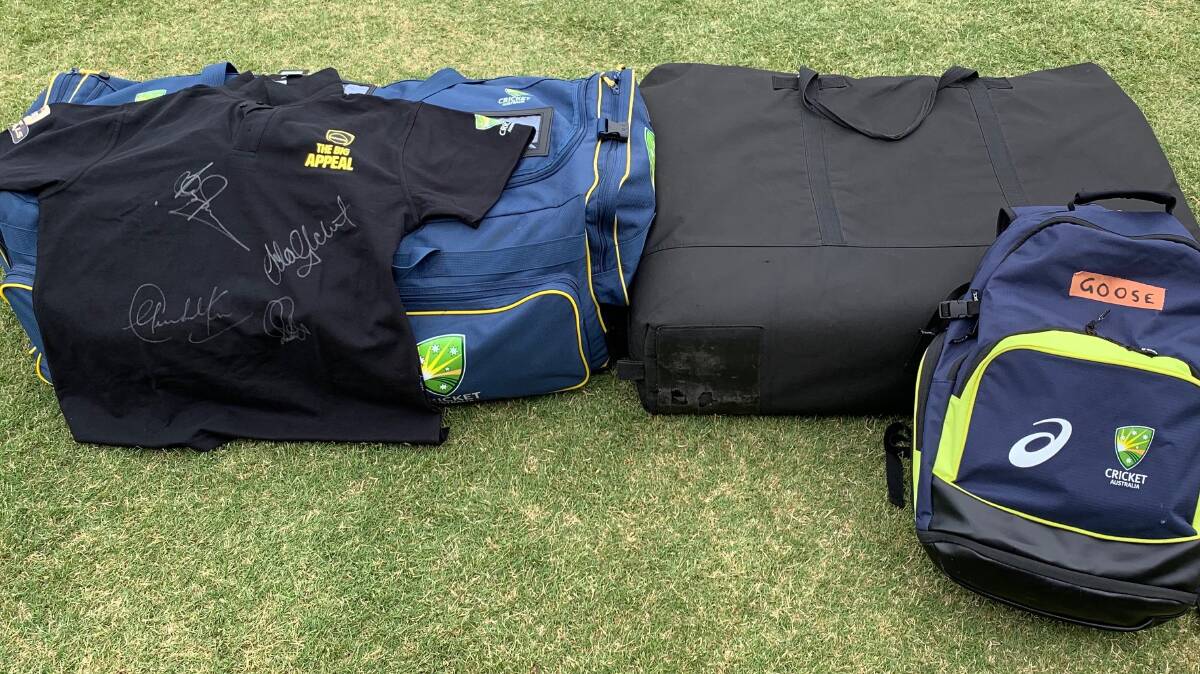 SIGNATURES GALORE: Angus Le Lievre and his kit, featuring signatures from Ponting, Lara, Gilchrist and Tendulkar. 