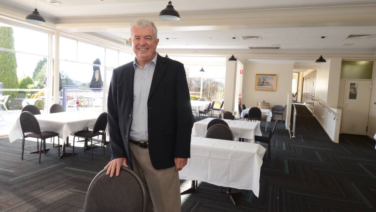 SLOWLY OPENING UP: Duntryleague board chair John Cook in the dining room on Friday. Photo: JUDE KEOGH