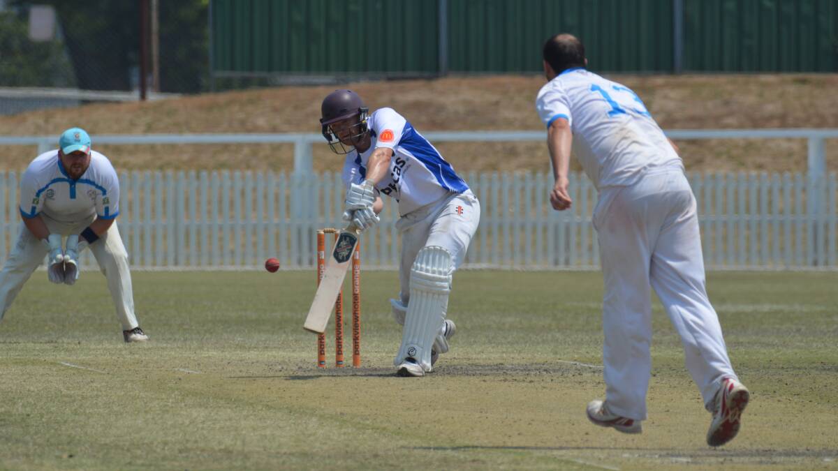 LOFTED DRIVE: Matt Corben sends one out through the covers for Orange against Dubbo before Christmas. Photo: MATT FINDLAY. 
