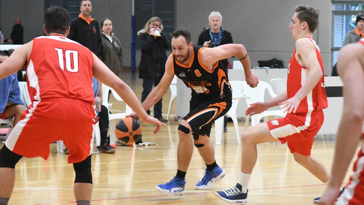 DRIVEN: Orange Eagles skipper Mitch Selwood drives at the basket in his side's nine-point loss over the weekend. Photo: JUDE KEOGH