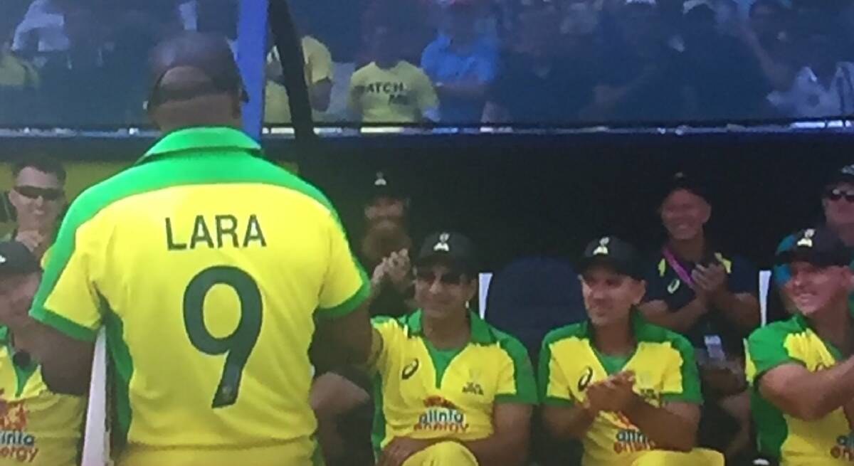 WITNESSING GREATNESS: Le Lievre in the back of the dugout behind Wasim Akram watching Brian Lara come off the ground. 